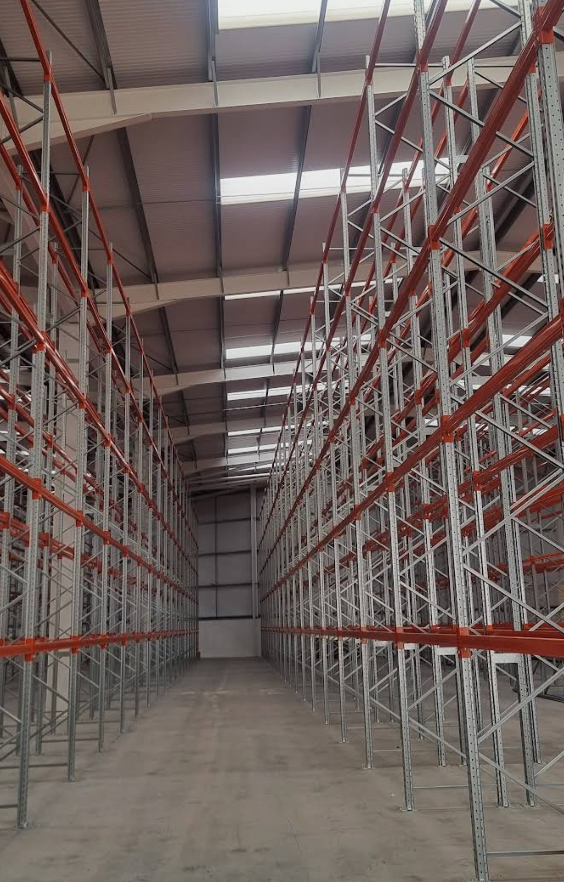 Pallet racking installation — before and after | UM Storage Systems